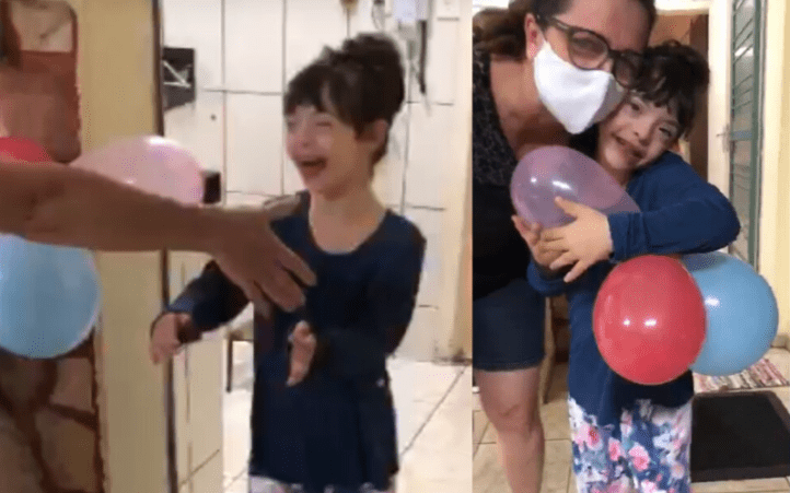 Menina com síndrome de Down se emociona ao abraçar os pais curados da covid-19